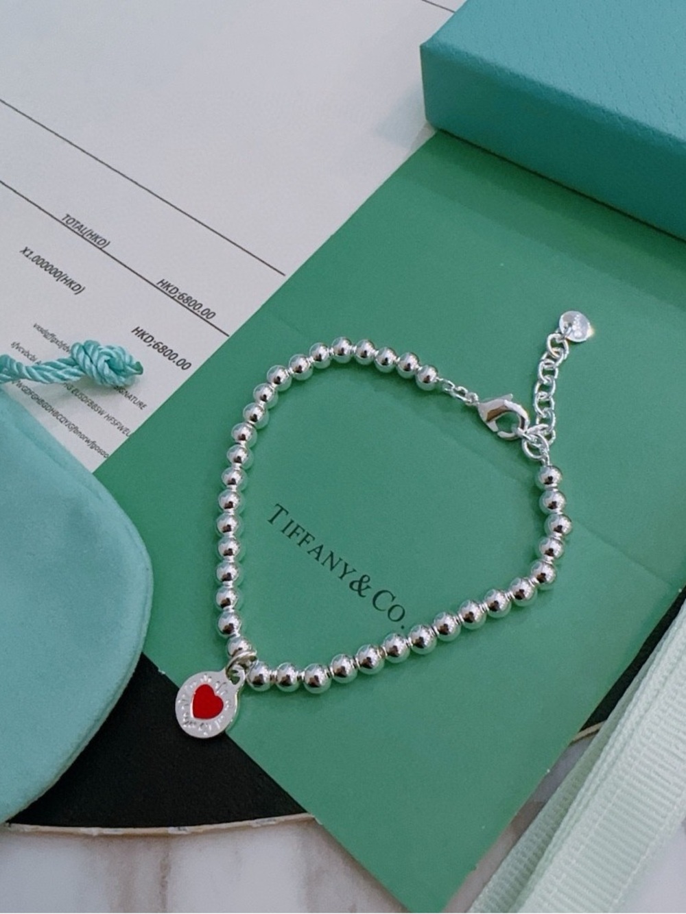 Tiffany & Co. Silver Beaded Bracelet with Red Heart Charm